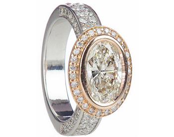 14K ROSE GOLD AND WHITE GOLD OVAL SHAPED DIAMOND RING