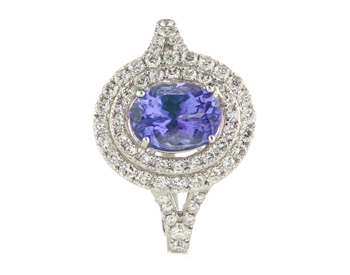 18K WHITE GOLD OVAL TANZANITE AND DOUBLE HALO DESIGN RING