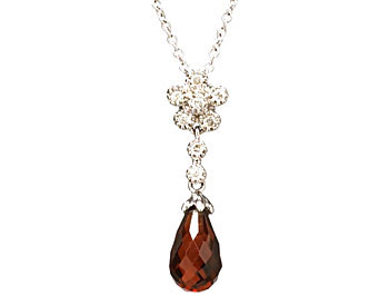 2.20CT GARNET BRIOLETTE AND DIAMOND FLOWER BALE 