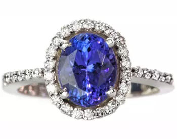 14K WHITE GOLD OVAL TANZANITE AND DIAMOND HALO RING