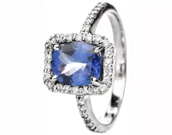 14K WHITE GOLD OVAL TANZANITE AND CUSHION PAVE DIAMOND HALO RING