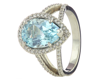 14K WHITE GOLD PEAR SHAPED SKY BLUE TOPAZ AND ROUND DIAMOND RING