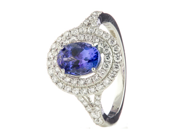 18K WHITE GOLD OVAL TANZANITE AND DOUBLE HALO DESIGN RING